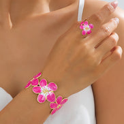 Brushed Iron Flowers Bangle for women with Electroplated Golden Plated Finish